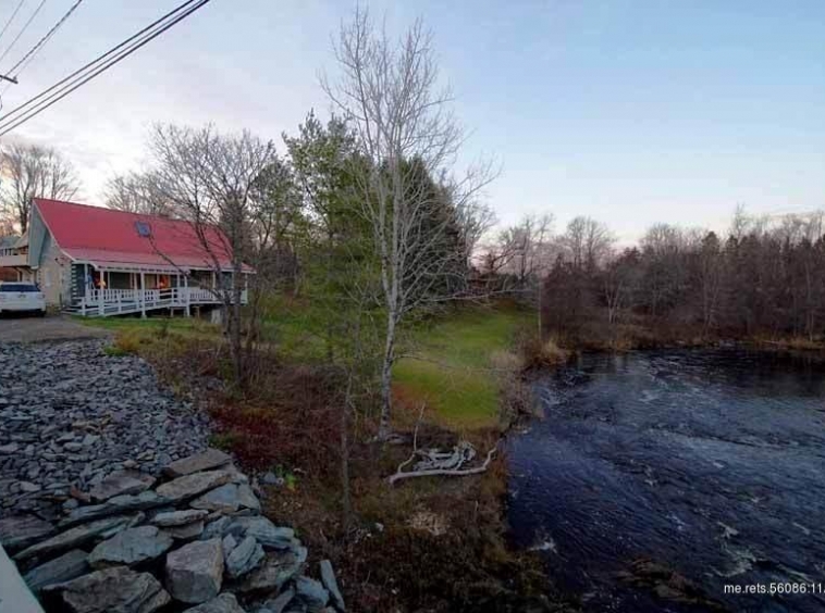 Log Home In Maine On River