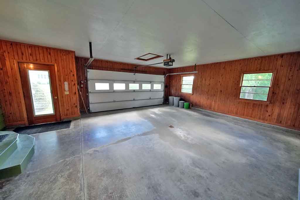 Attached double garage with power doors houlton maine home